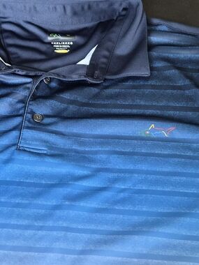 Greg Norman Collection Blue Ombre Striped Polo with Multicolor Shark Logo